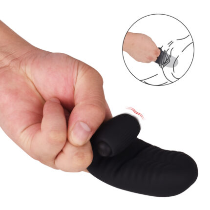 A hand firmly grips a pair of black, textured Cunnilingus Stimulation Wear Gloves Silicone Vibrating Finger Sets. An inset illustration shows the product in use, indicating it is meant for internal stimulation. The design highlights ergonomic use for targeted pleasure.