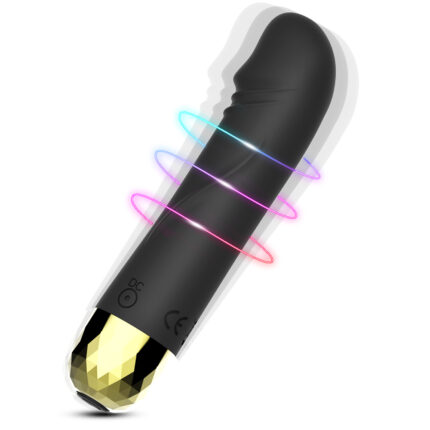 This image shows a black vibrator. The top of the vibrator is slightly curved for G-spot stimulation. The gold diamond-cut design on the bottom adds a luxurious feel. The vibrator is made of smooth material and the overall design is stylish and modern.