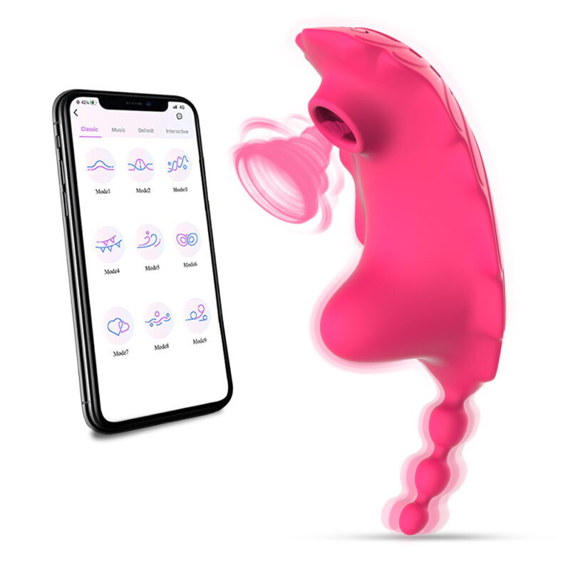 A mobile phone displaying various modes of control is positioned next to a pink, ergonomically designed wearable strap-on silicone adult toy. The toy appears to feature a suction element and a ridged appendage, with motion lines indicating vibration, emphasizing its functionality as a silicone G-spot stimulator and vagina massager for women or lesbian couples.