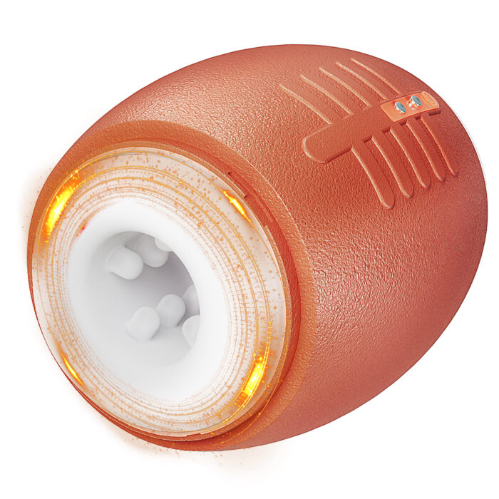 A close-up image of the Automatic Male Masturbator, an orange, oval-shaped male sex toy. The device features a textured surface and a ring of orange lights near the front opening. Inside the opening, multiple white massage balls can be seen.