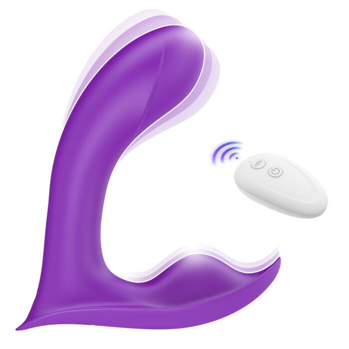 A Realistic Wearable Dildo G-Spot Stimulator Lifelike One-Piece Penis Silicone Pants Vagina Massager is shown alongside a small, white remote control. The remote has a couple of buttons and emits blue waves, indicating wireless operation. The massager features a smooth, ergonomic shape for comfort with a sleek design in purple.