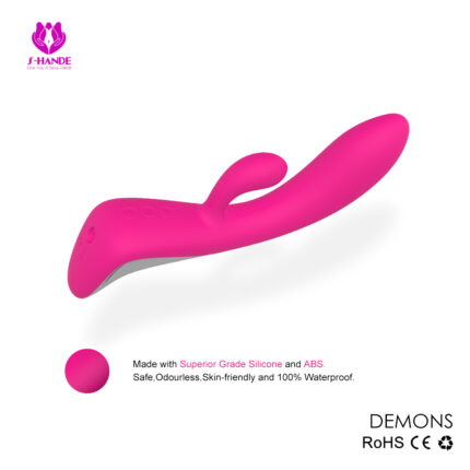 Introducing the DEMONS Sex Toy: a pink silicone vibrator designed with a curved shape and an additional small protrusion. Marketed as safe, odorless, skin-friendly, and 100% waterproof, it is made with superior grade silicone and ABS materials. The product comes with certifications including RoHS and CE for added peace of mind.