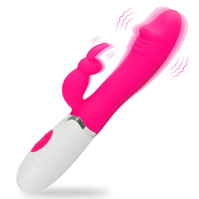 This is a pink adult toy with a modern design and multiple features. The toy has a curved main shaft with ridges at the tip, specifically designed for internal and G-spot stimulation. It also includes a flexible rabbit ear-shaped extension for clitoral stimulation. The toy offers multiple vibration frequencies, allowing users to choose according to their preferences. The base of the toy is white with a red control button for adjusting the vibration modes. Vibrating lines are depicted around the toy to emphasize its powerful vibration capabilities. The overall design is ergonomic, easy to hold, and intended to provide enhanced sexual pleasure through its multiple functions and dual stimulation.