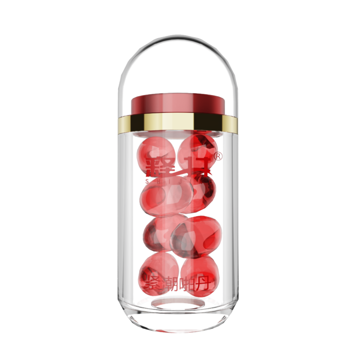 A transparent cylindrical container with a red lid and gold trim, filled with red capsules. Chinese characters adorn the container, which sits against a plain gray background. It's labeled as "Enhancing Pleasure Pill Gel (Classic Rose Pill Version 2)," designed to assist sexually lukewarm couples by increasing female sexual interest and pleasure with an 8-pill pack of 600mg each.