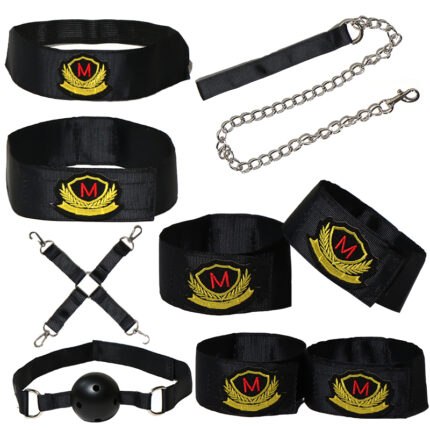 Black bondage set including handcuffs, ankle cuffs, ball gag, and chains with a red emblem.